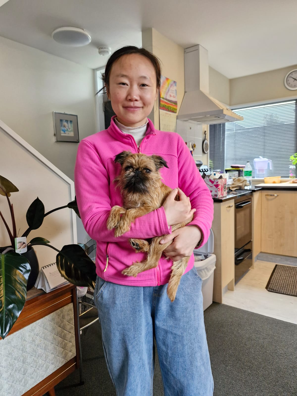 me holding a cute little dog